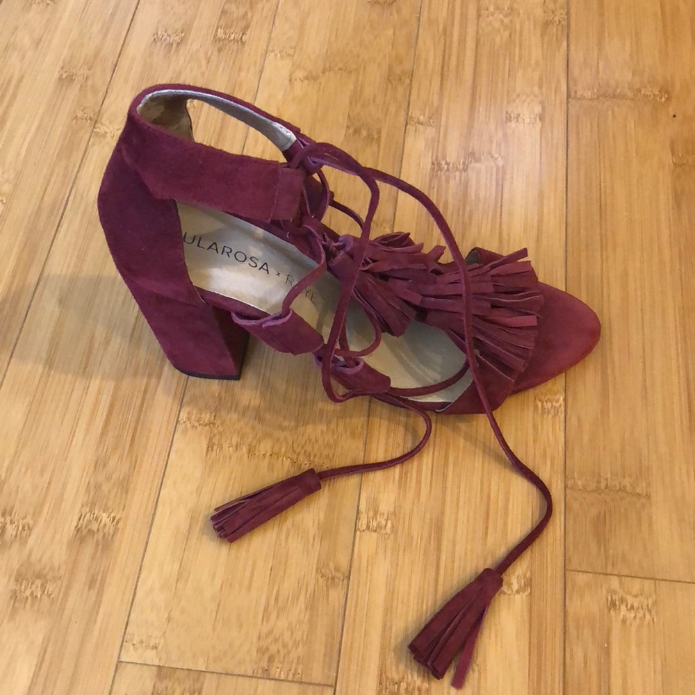 TularosaXRaye red suede fringe heeled sandals.